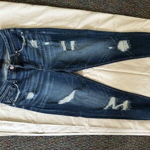 Gently worn buckle black size 30 high rise ankle skinny jeans